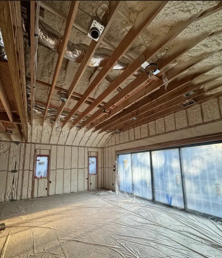 Interior walls and ceiling insulated with spray foam during new construction in Lantana